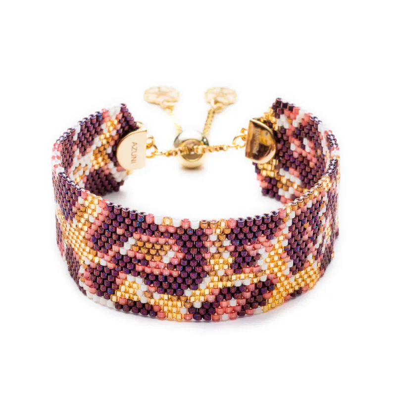 Narrow Snow Leopard Bead Cuff: Acapulco sold by Azuni London