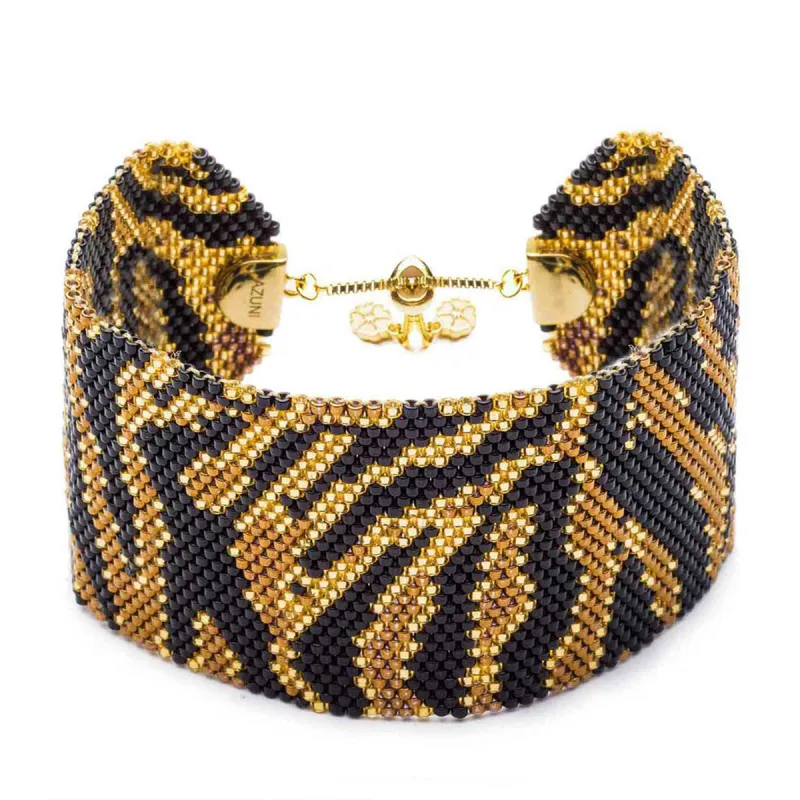 Zebra Hand Stitched Cuff: Zebra Bronze sold by Azuni London
