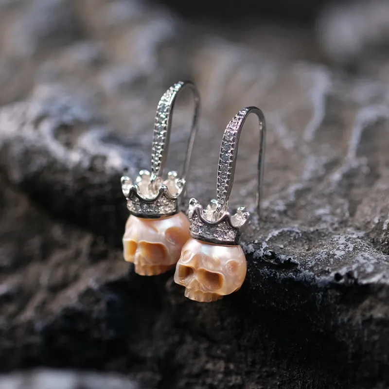 Diamond-Studded Crown Pearl Skull Earrings sold by Belle Juri