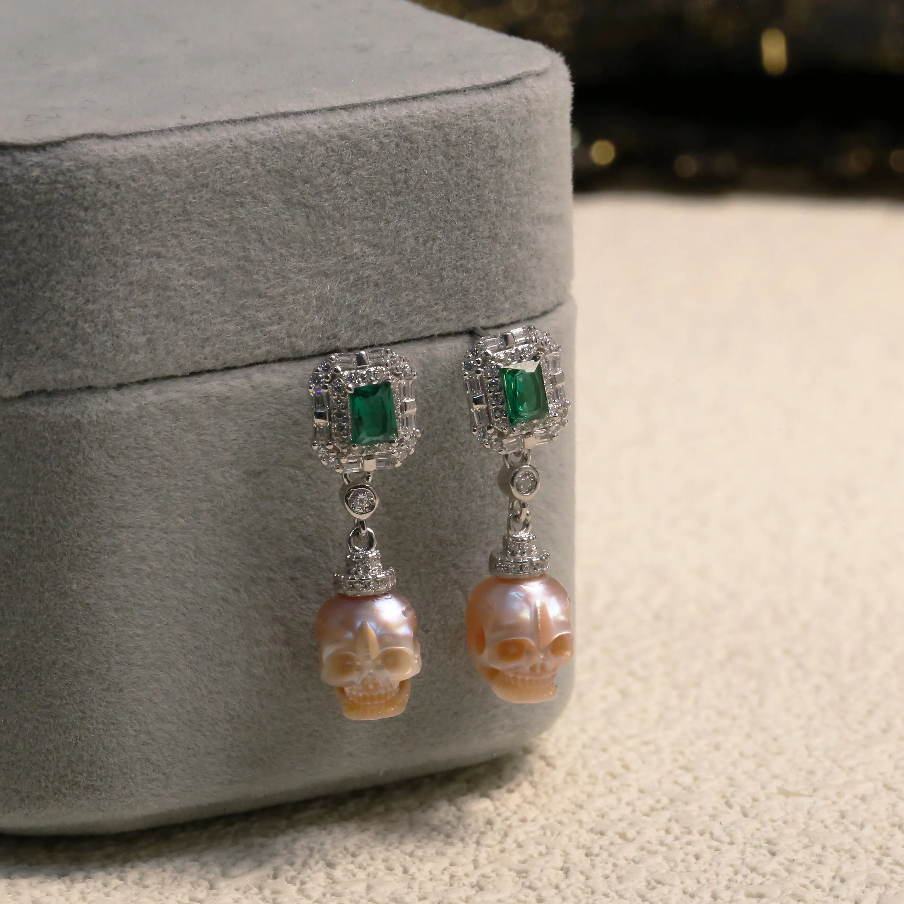 Emerald CZ Halo Pearl Skull Dangle Earrings sold by Belle Juri product image thumbnail 4