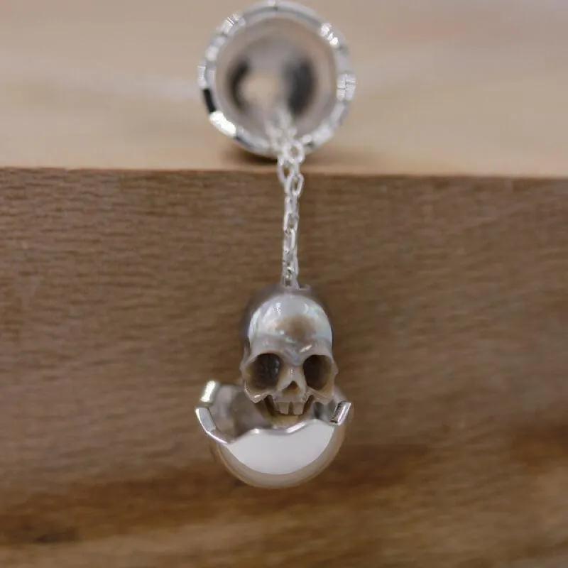 Eggshell Broken Pearl Skull Silver Pendant Necklace sold by Belle Juri