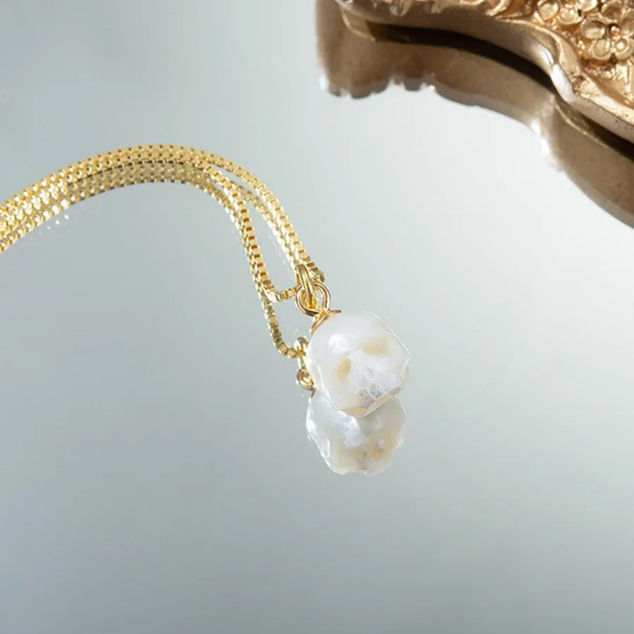 Dainty Simple Pearl Cranium Pendant Necklace sold by Belle Juri