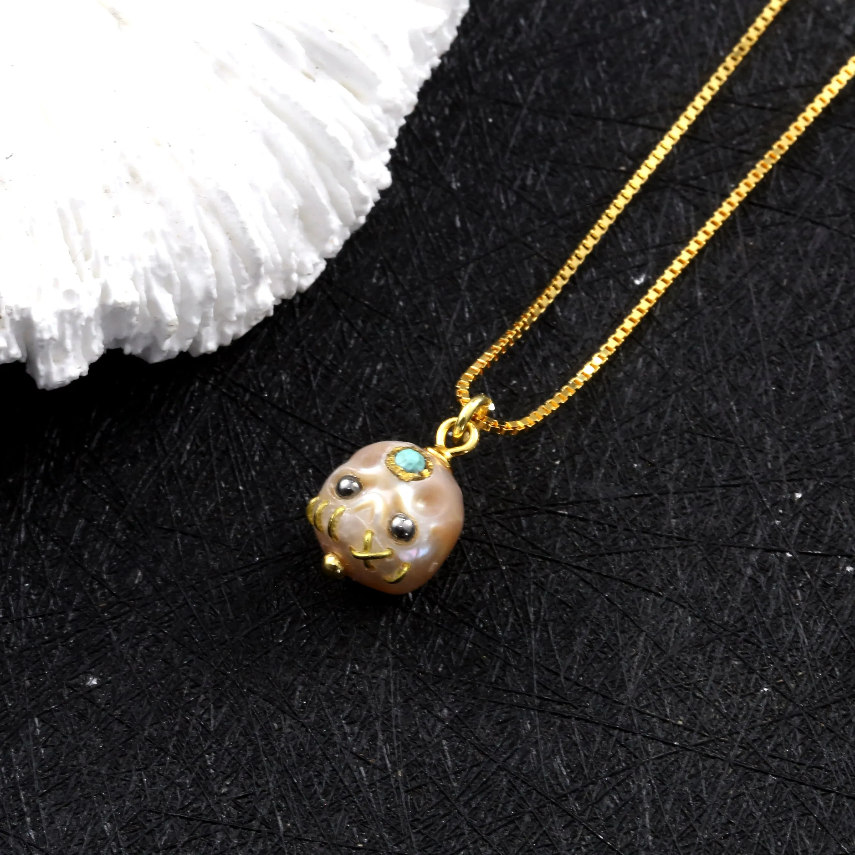 Carved Pearl Skull Śmaśana Bead Necklace With Black Eyes sold by Belle Juri