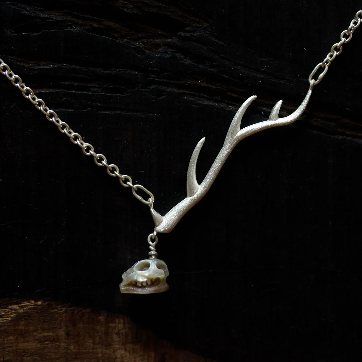 Carved Pearl Deer Antler Necklace sold by Belle Juri