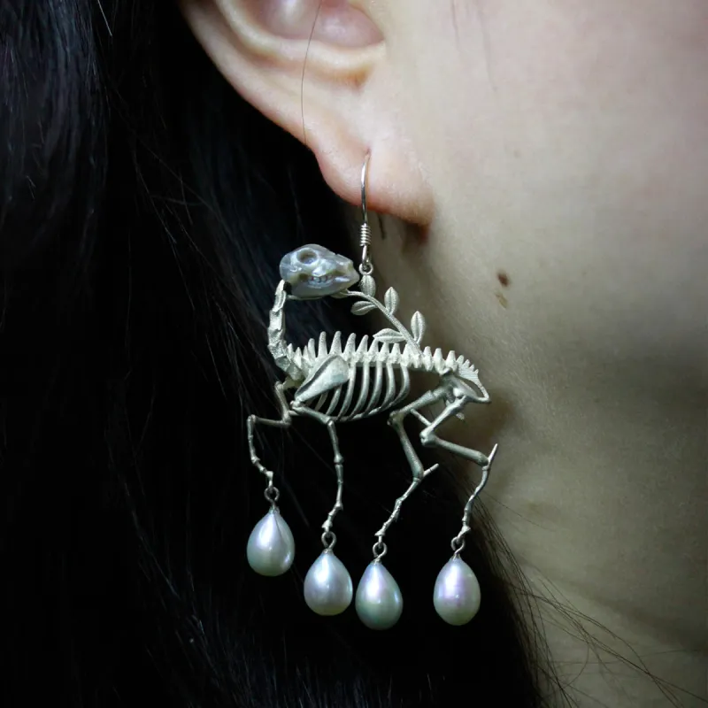 Carved Pearl Skull Reindeer Skeleton Earrings & Necklace sold by Belle Juri