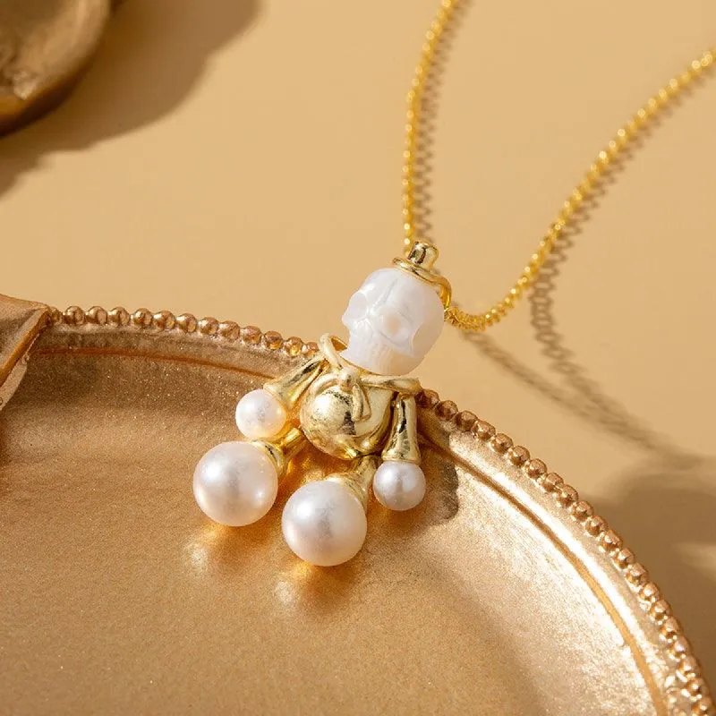 Doll Pearl Skull Necklace sold by Belle Juri