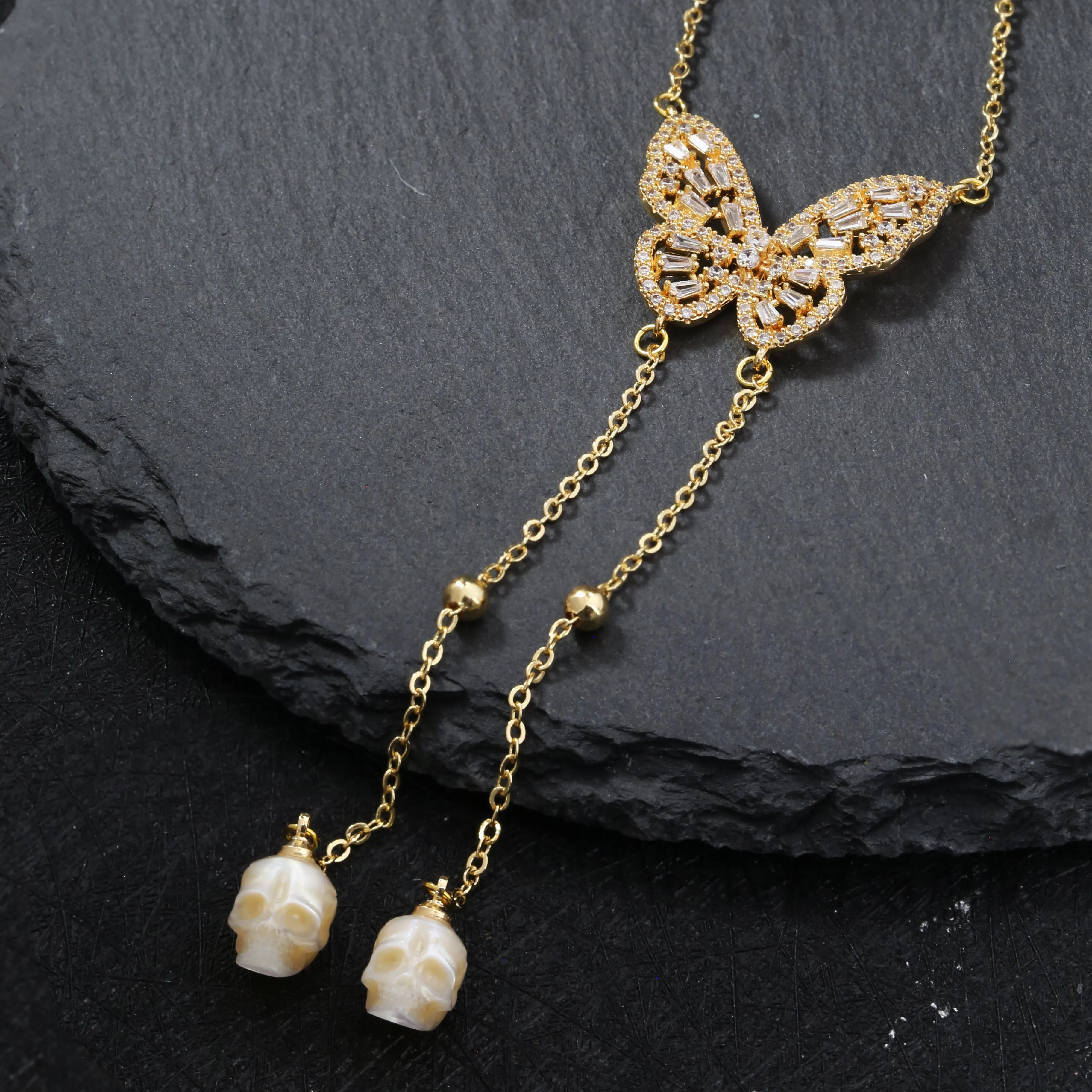 Golden Butterfly Gemstone Skull Pearl CZ Pendant Necklace sold by Belle Juri
