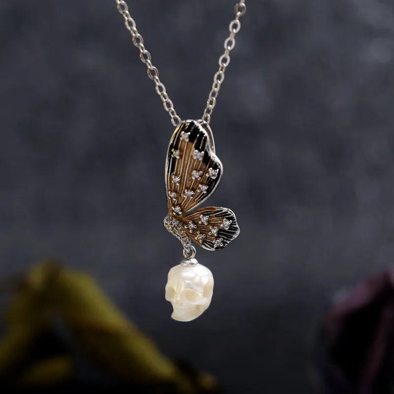 Butterfly Wing Pearl Skull Necklace sold by Belle Juri