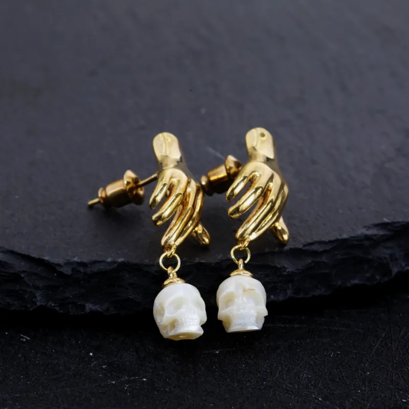 Hand Shaped Pearl Skull Statement Earrings sold by Belle Juri