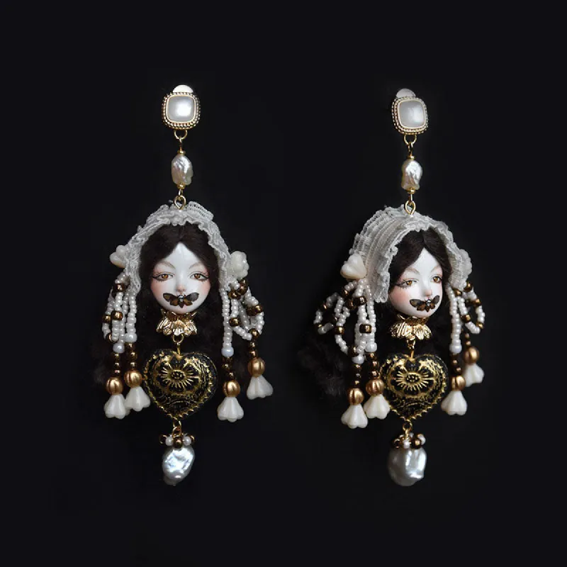 Handcrafted Baroque Doll Pearl Earrings sold by Belle Juri