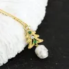 Dainty Christmas Tree Pearl Skull Necklace sold by Belle Juri