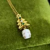 Dainty Christmas Tree Pearl Skull Necklace sold by Belle Juri