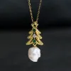 Dainty Christmas Tree Pearl Skull Necklace sold by Belle Juri