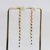 Refined Long Tassel Pearl Skull Earrings sold by Belle Juri