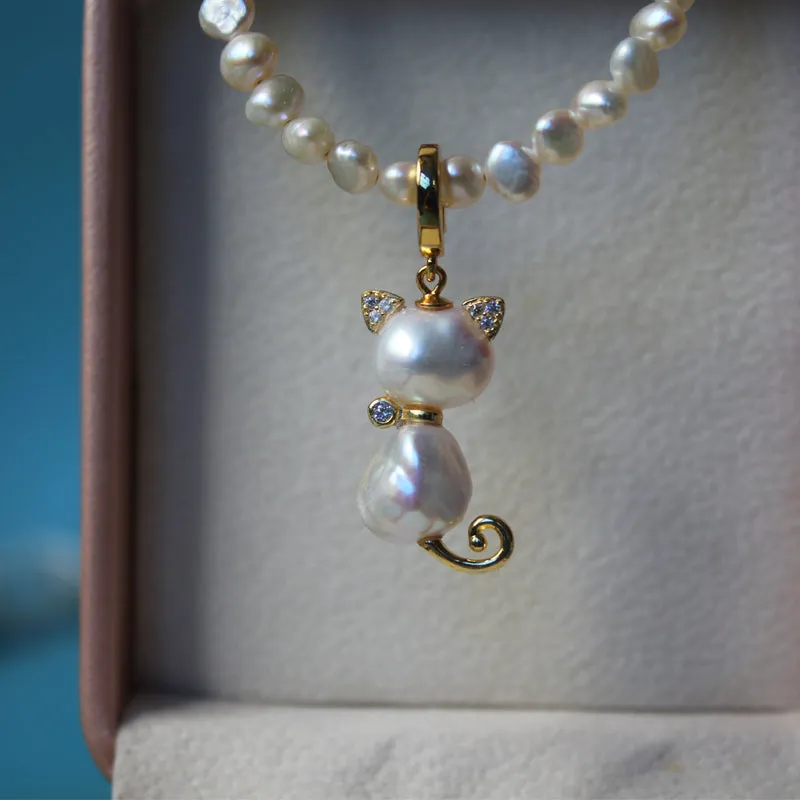 Whimsical Cat Baroque Pearl Necklace sold by Belle Juri