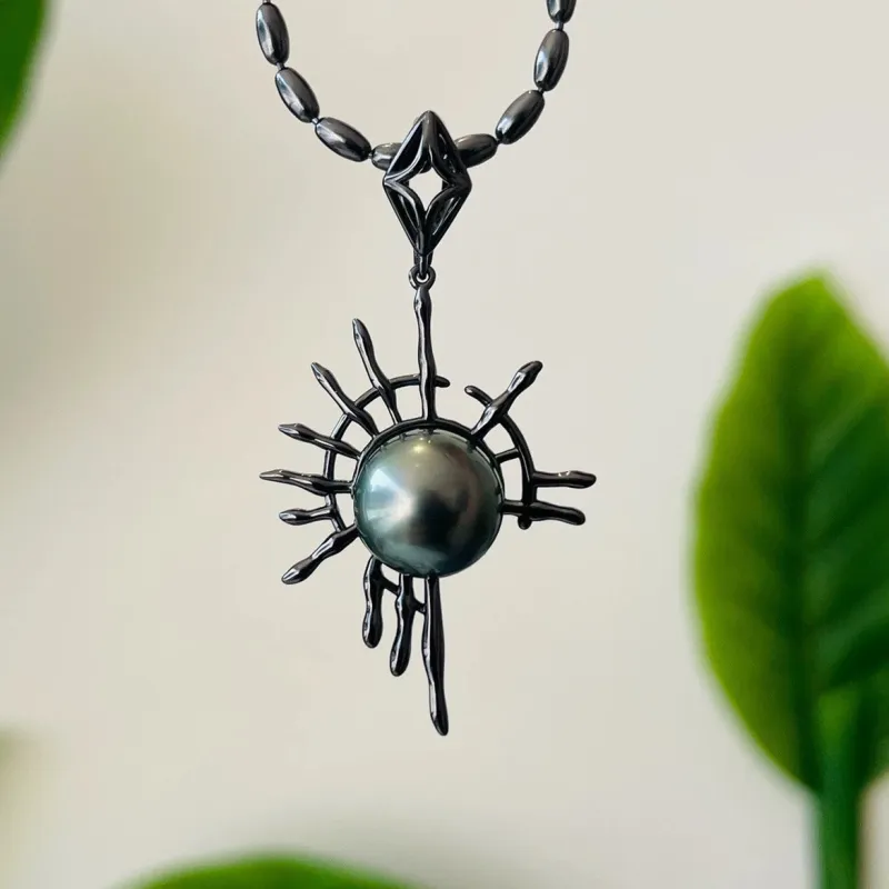 Gothic Sun God Black Tahitian Pearl Necklace sold by Belle Juri
