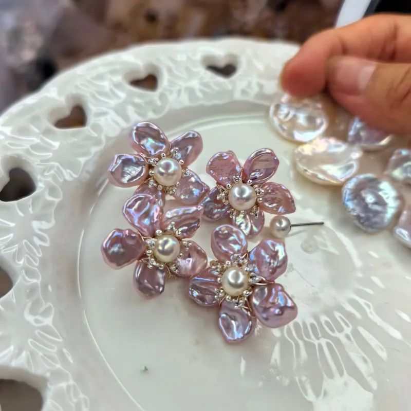 Handwoven Pink Floral Stud Earrings sold by Belle Juri