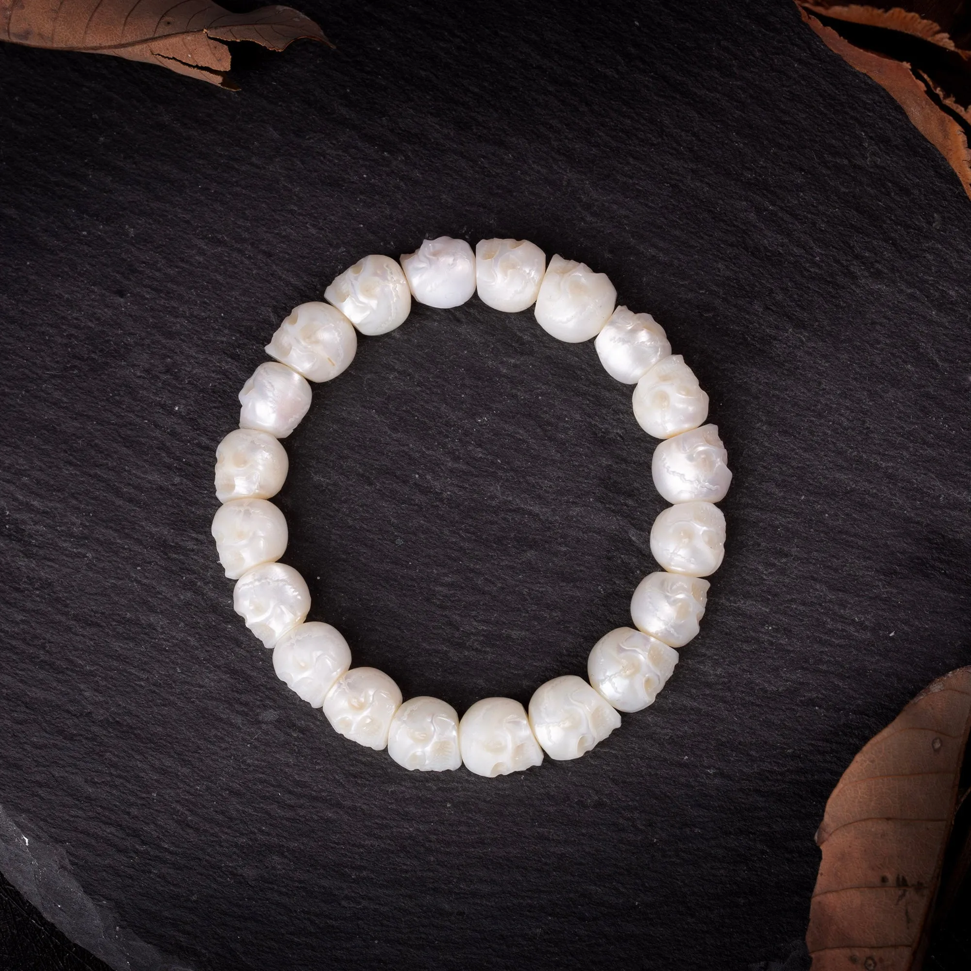 Hand-Carved Skull Pearl Bracelet sold by Belle Juri