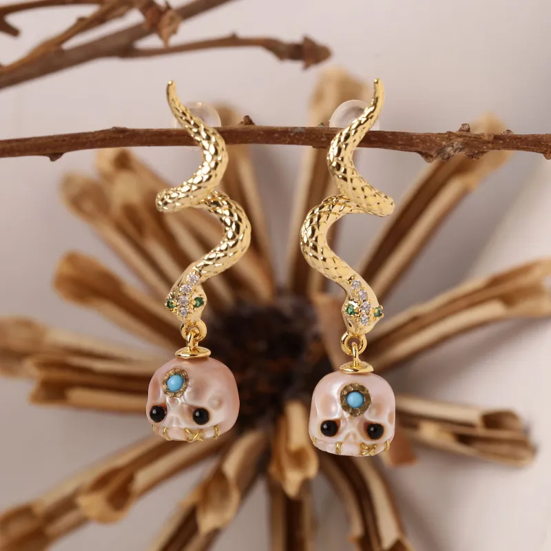 Gold Snake Śmaśana Skull Earrings made by Belle Juri