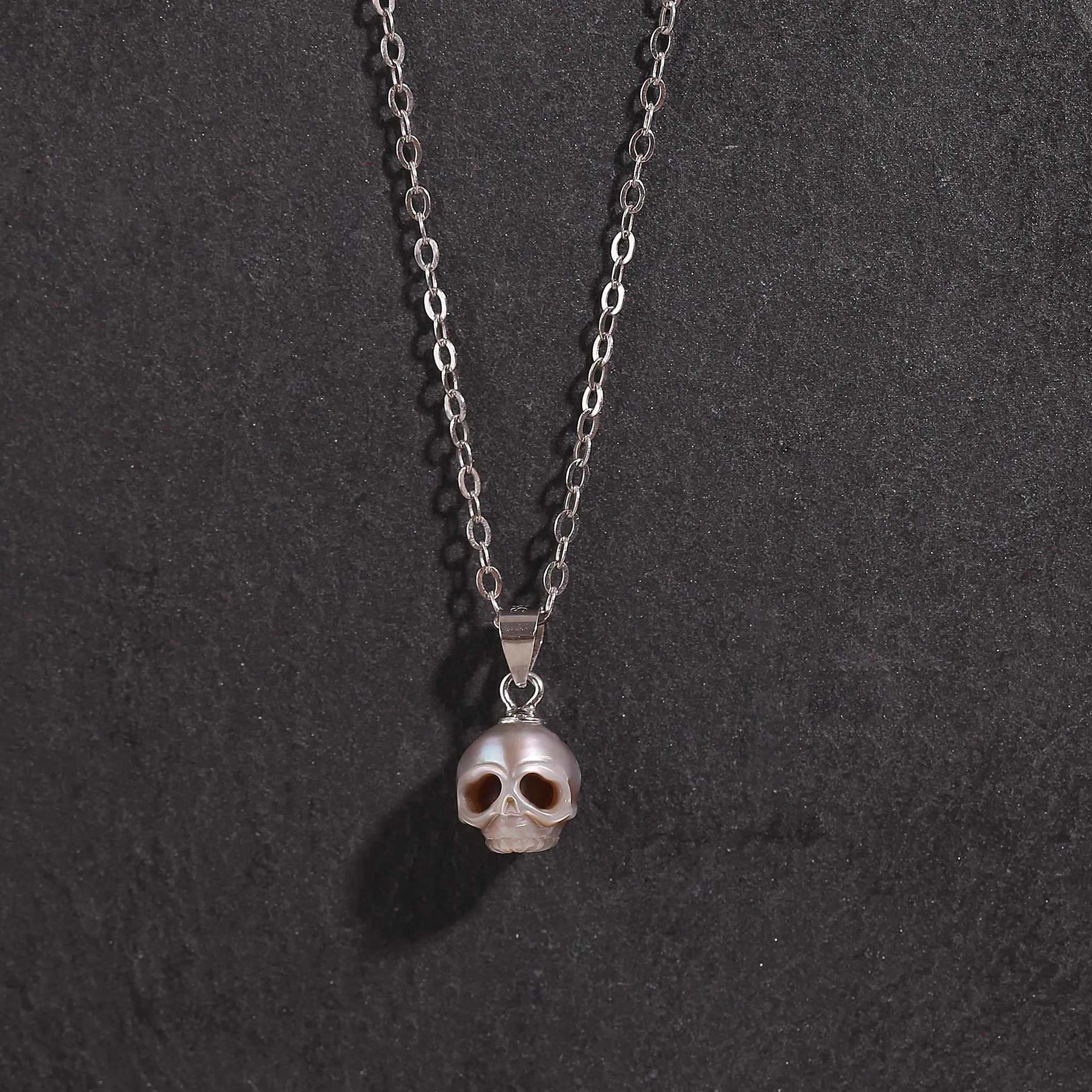 Grey Gothic Cranium Pearl Pendant Necklace sold by Belle Juri