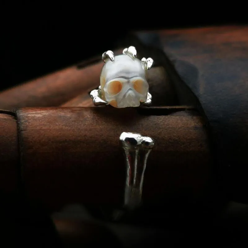 Pearl Cranium Skeleton Hand Bone Ring sold by Belle Juri
