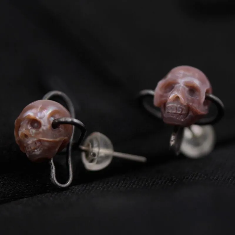 Three-dimensional Cross Carved Pearl Skull Stud Earrings sold by Belle Juri