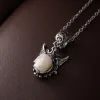 Devil's Wing Pearl Skull Pendant Necklace sold by Belle Juri