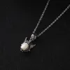 Devil's Wing Pearl Skull Pendant Necklace sold by Belle Juri
