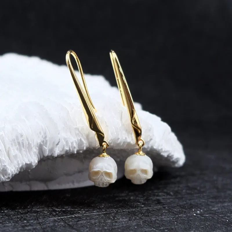 Minimalist Pearl Cranium Hook Earrings sold by Belle Juri