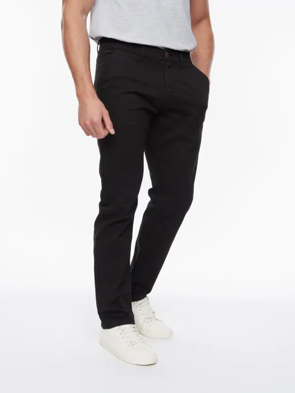 Tasman Chinos Black sold by Bewley and Ritch