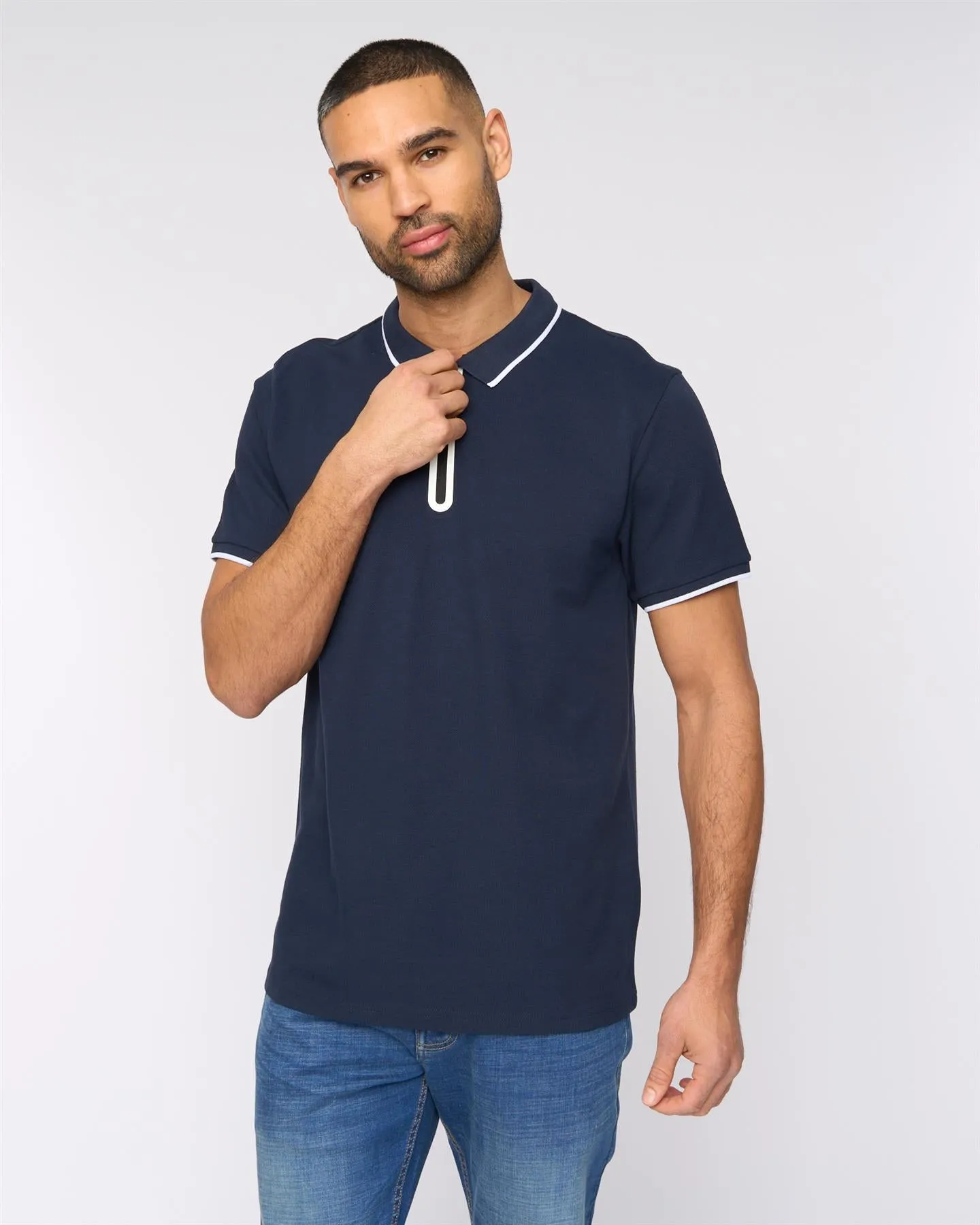 Oakden Zip Front Polo Navy sold by Bewley and Ritch