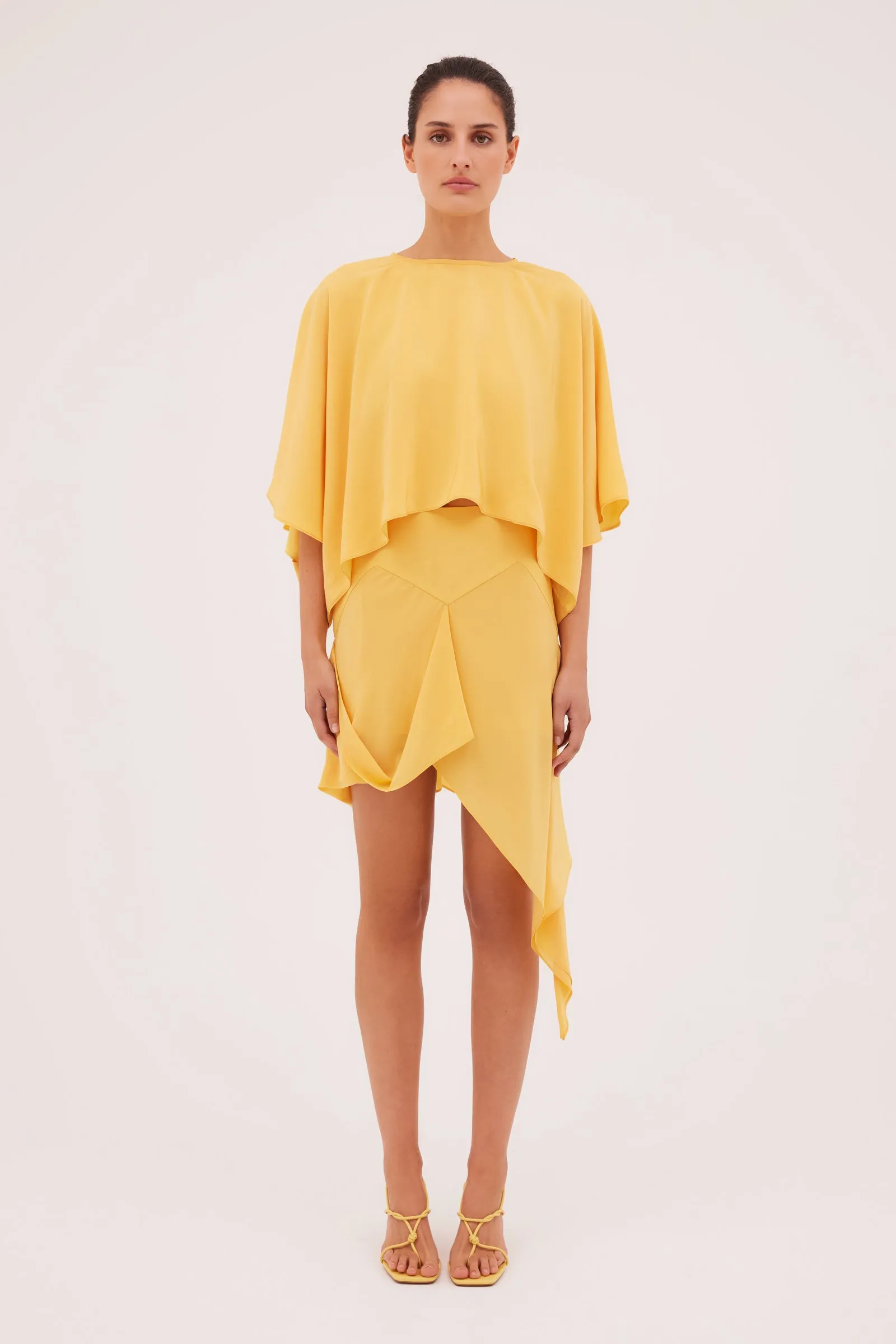 DAFFODIL SILK SPIRITED MINI SKIRT sold by Bianca Spender