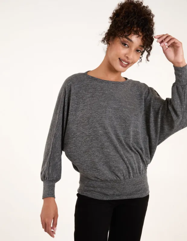 Metallic Deep Hem Batwing Top sold by Blue Vanilla