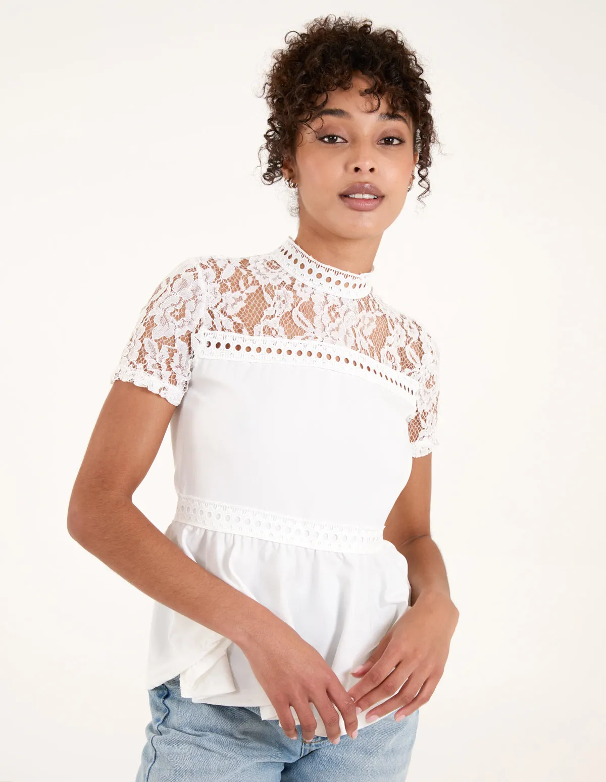 Lace Trimmed Peplum Top sold by Blue Vanilla
