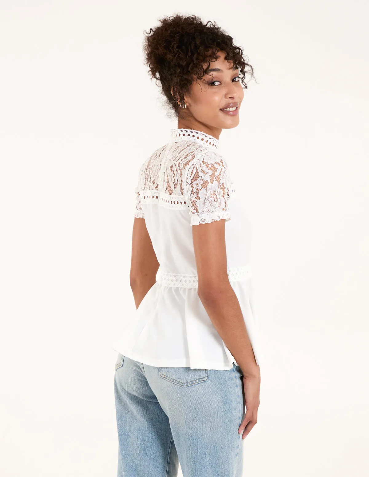 Lace Trimmed Peplum Top sold by Blue Vanilla product image thumbnail 4