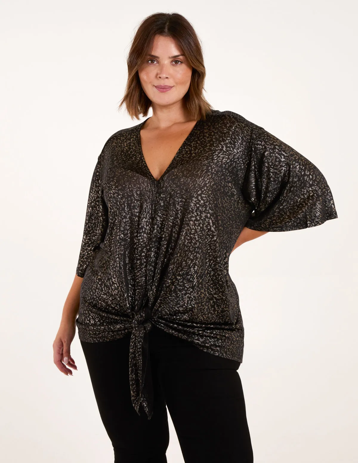 Curve Leopard V Neck Tie Front Top sold by Blue Vanilla