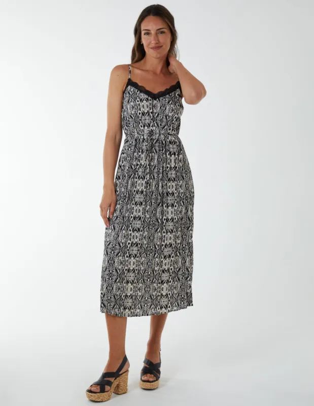 Pleated Midi Slip Dress With Lace Trim sold by Blue Vanilla