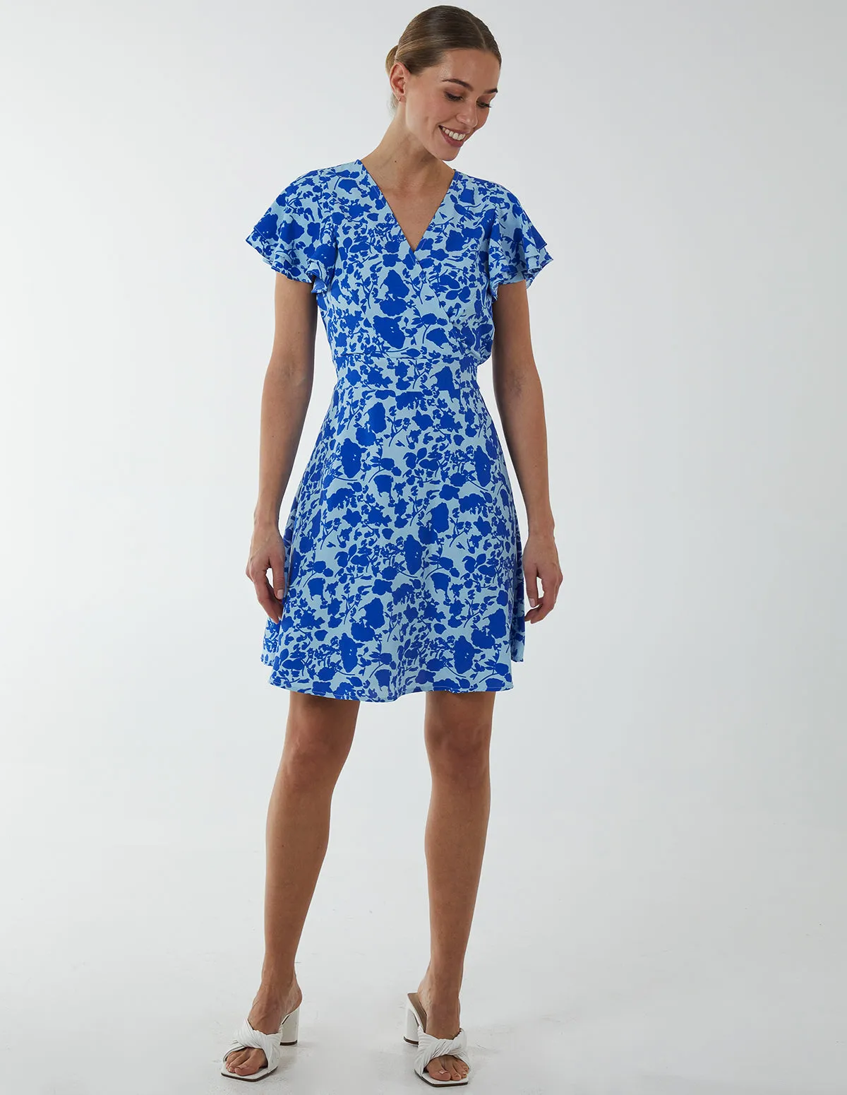 Wrap Ruffle Mini Dress sold by Blue Vanilla