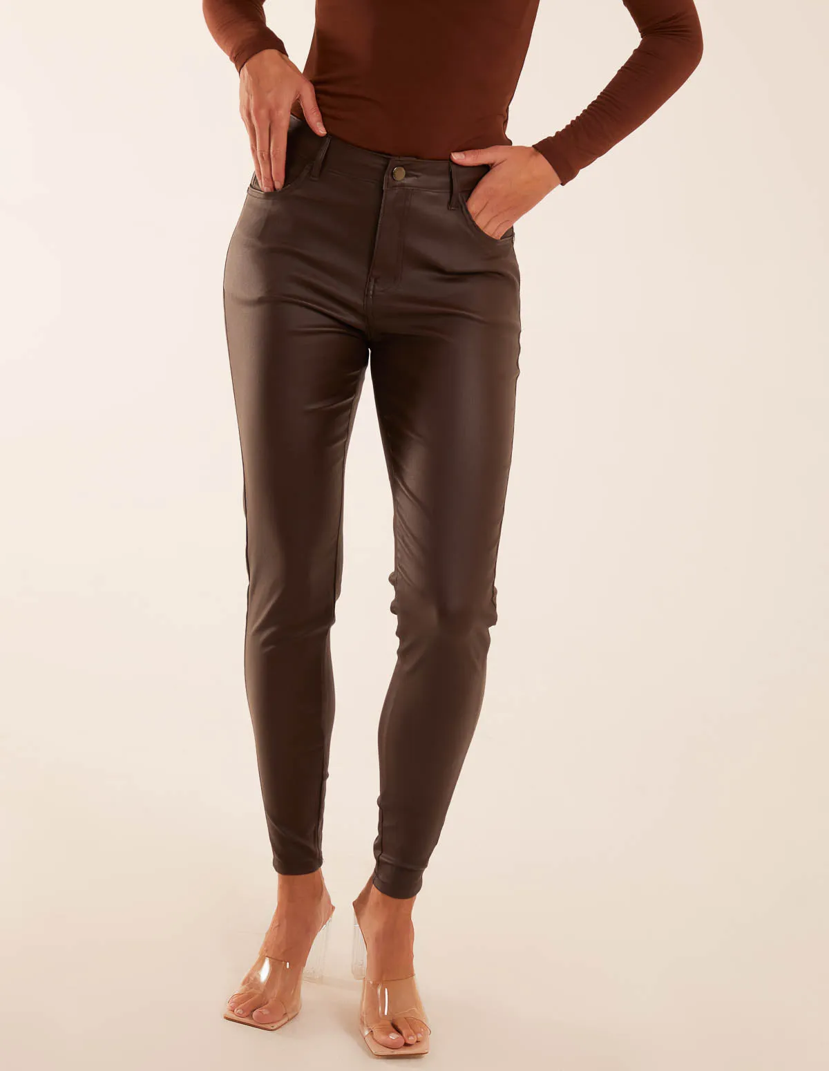 PU Mid Rise Coated Skinny Jeans sold by Blue Vanilla