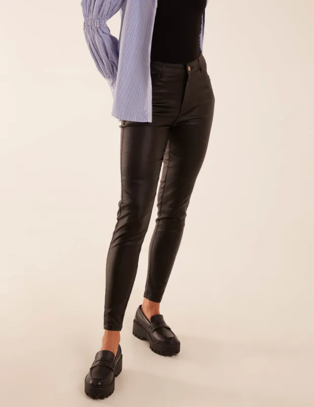 PU Mid Rise Coated Skinny Jeans sold by Blue Vanilla