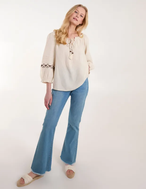 Embroidered Pleat Sleeve Top sold by Blue Vanilla