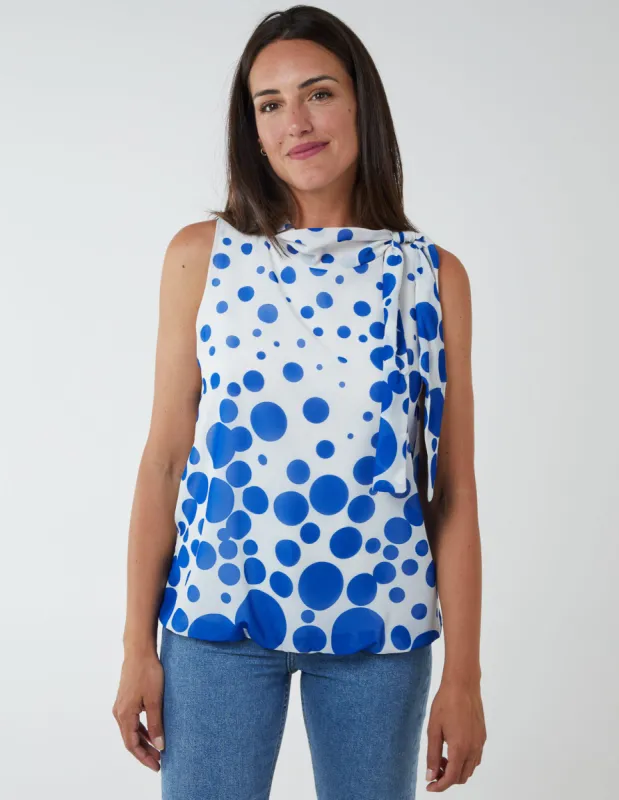 Sleeveless Polka Dot Top With Tie Neck sold by Blue Vanilla