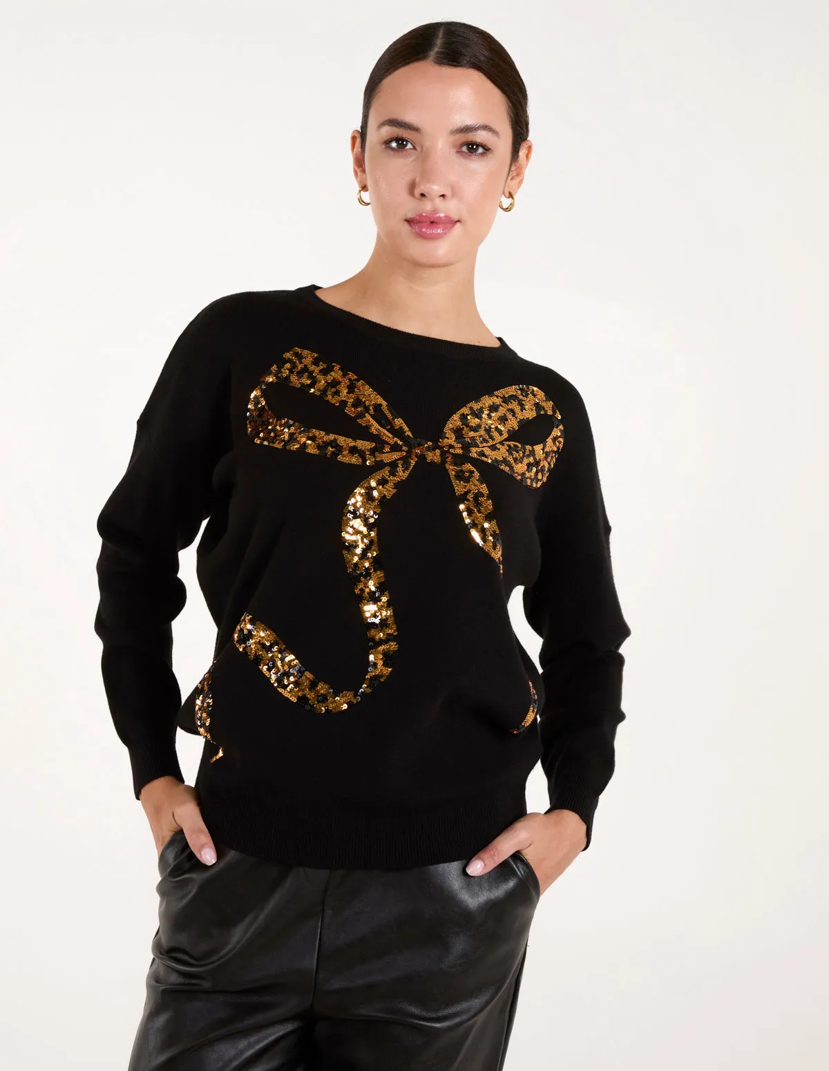 Christmas Leopard Bow Sequin Jumper sold by Blue Vanilla