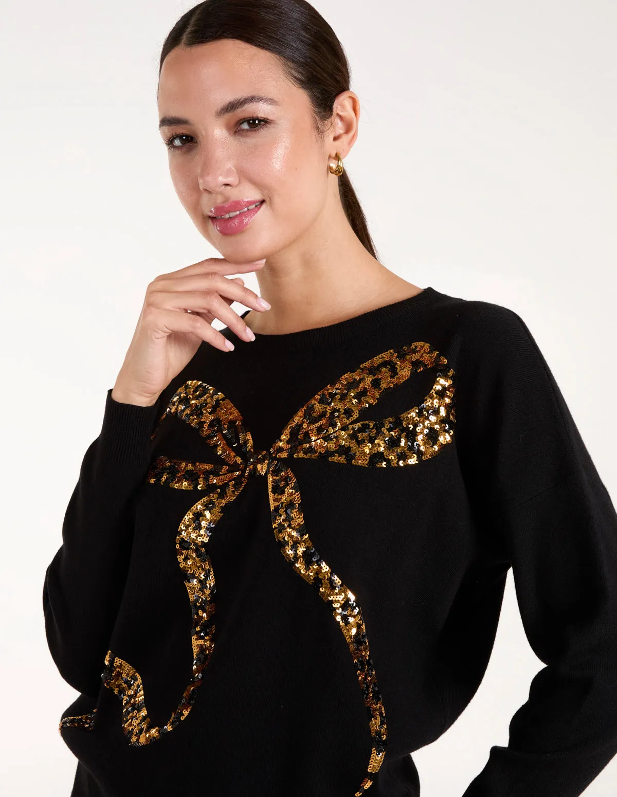 Christmas Leopard Bow Sequin Jumper sold by Blue Vanilla product image thumbnail 3