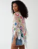 Crochet Fringe Poncho sold by Blue Vanilla