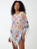 Crochet Fringe Poncho sold by Blue Vanilla