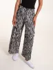 Abstract Zebra Pleated Trousers sold by Blue Vanilla