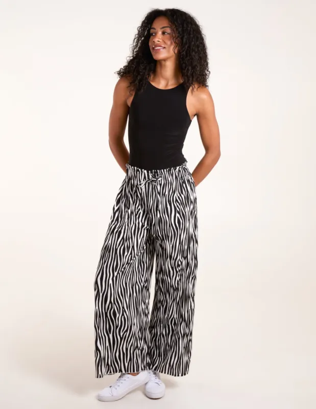 Abstract Zebra Pleated Trousers sold by Blue Vanilla