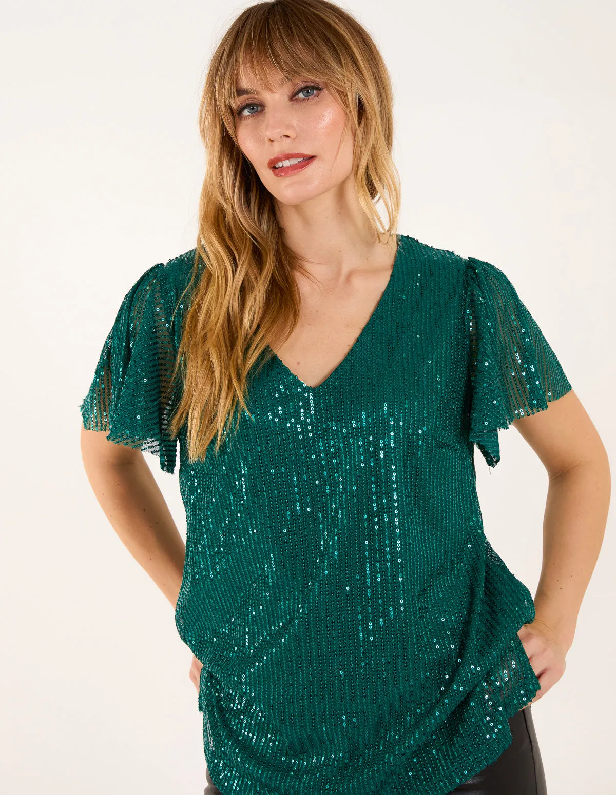 Angel Sleeve V Neck Sequin Top sold by Blue Vanilla