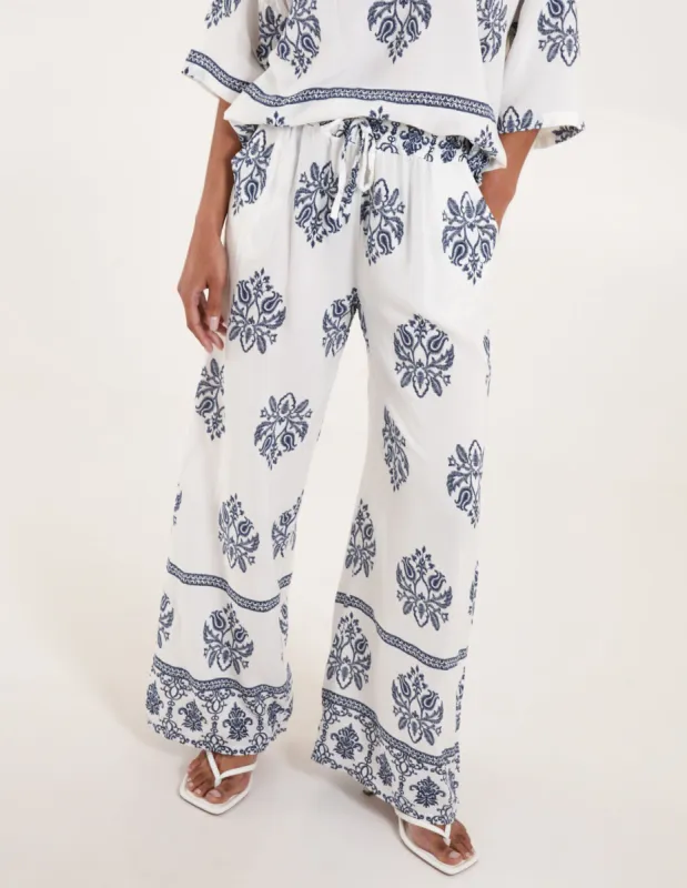 Border Print Wide Leg Trousers sold by Blue Vanilla